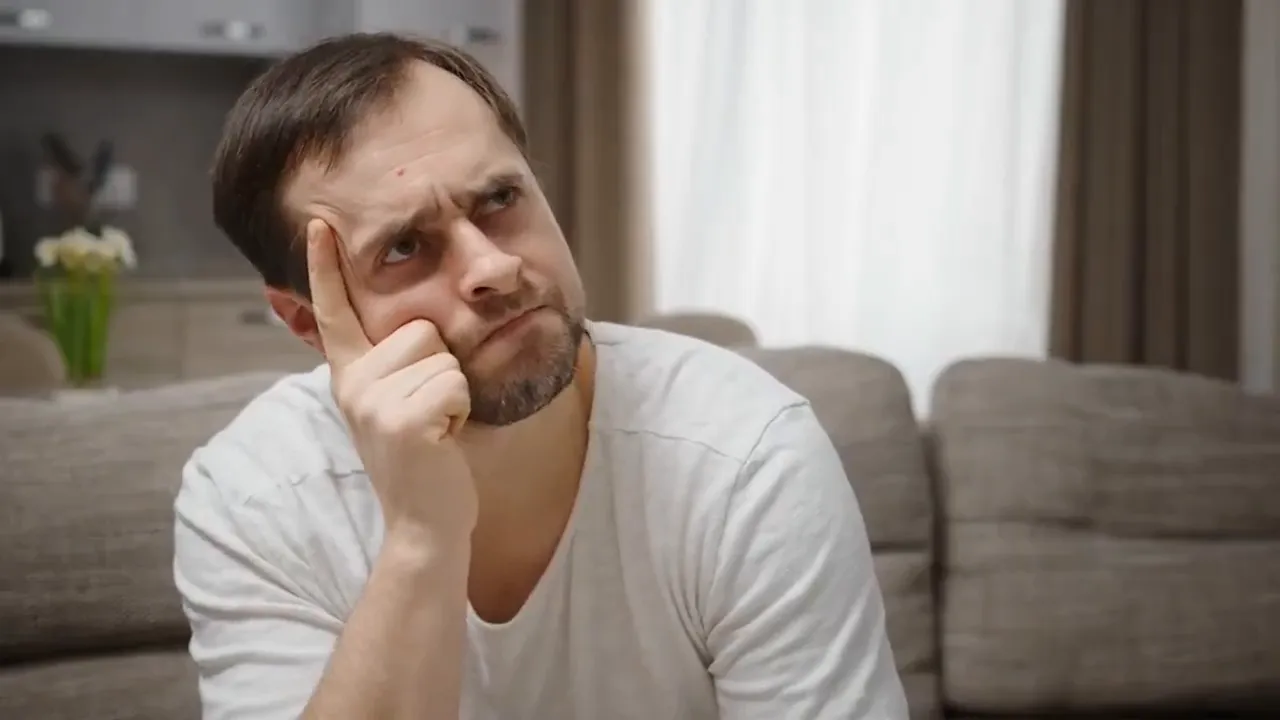 Older adult struggling to focus on a task